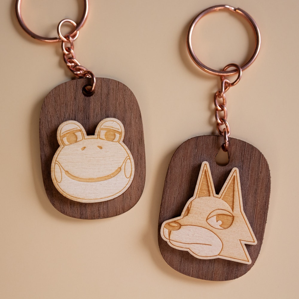 Deux porte-clés Animal Crossing en bois